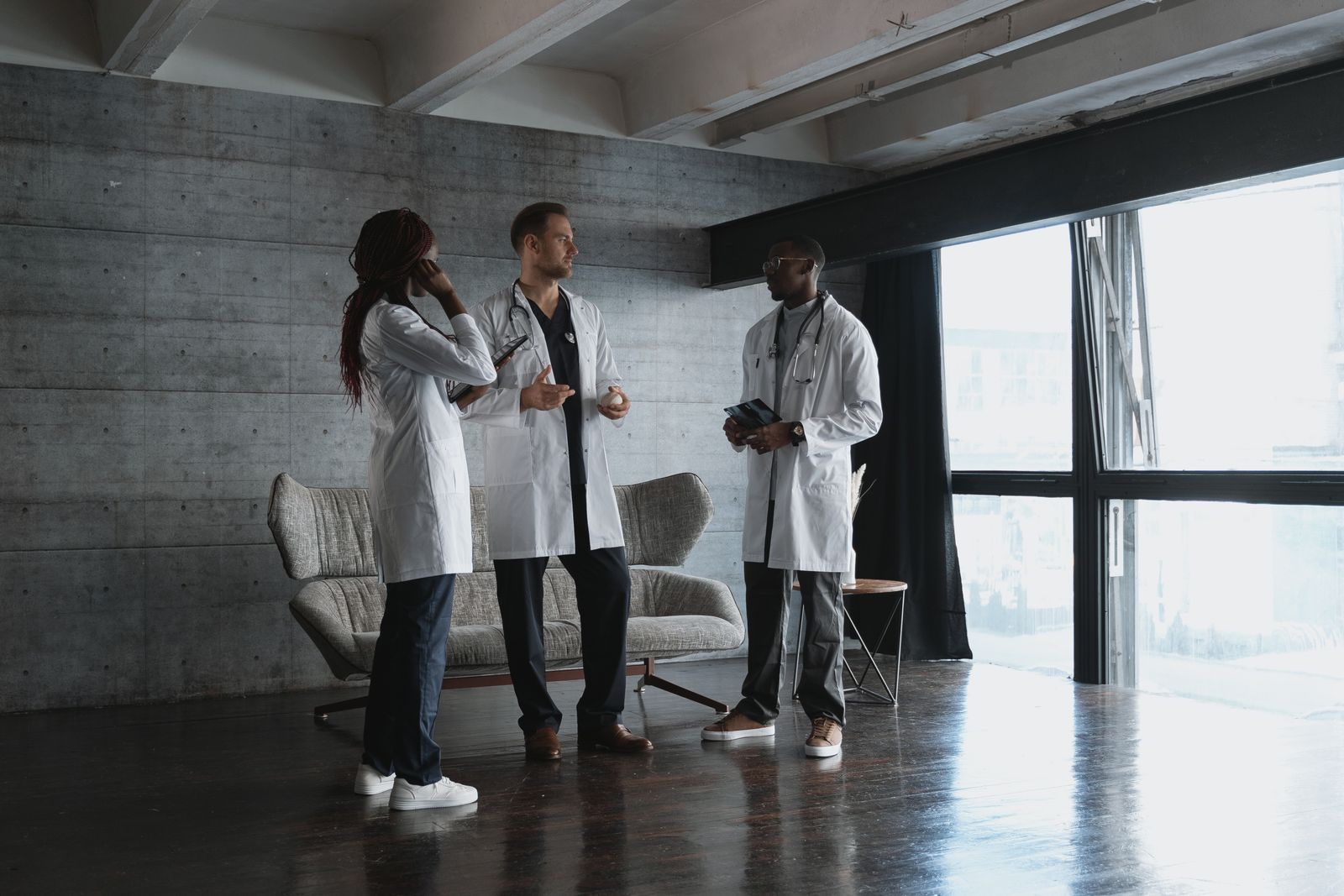 An anesthesia care team conferring before a case